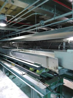 Vibrating conveyor demonstrating oscillating motion Vibrating conveyor demonstrating oscillating motion