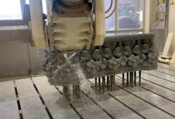 Stone artistry meets technology as CNC machines carve intricate designs. Stone artistry meets technology as CNC machines carve intricate designs.