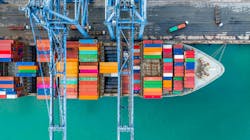 Aerial top view of a crane and shipping container Aerial top view of a crane and shipping container