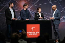 A panel discussion titled, “AI in Manufacturing,” moderated by Onuora Ogbukagu, director of Corporate Communications at Deutsche Messe (far right). Panelists from left to right: Sven Parusel, head of Research Partnerships, Agile Robots; Lilija Kucinskaja, product owner, AI & Analytics Solutions, German Edge Cloud; and Norbert Jung, CEO Bosch Connected Industry. A panel discussion titled, “AI in Manufacturing,” moderated by Onuora Ogbukagu, director of Corporate Communications at Deutsche Messe (far right). Panelists from left to right: Sven Parusel, head of Research Partnerships, Agile Robots; Lilija Kucinskaja, product owner, AI & Analytics Solutions, German Edge Cloud; and Norbert Jung, CEO Bosch Connected Industry.