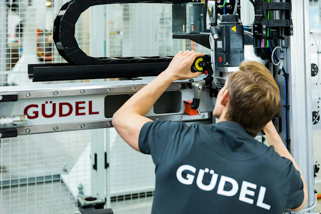 Maintaining &PlusMinus;0.02 mm repeatability under multi-ton dynamic loads requires highly rigid guideways and bearing systems engineered for real-world operating conditions, not just catalog assumptions.