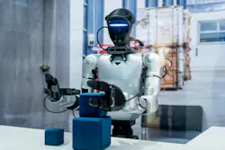 Humanoid robot in an industrial setting. Humanoid robot in an industrial setting.
