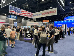 Visitors at the Standard Bots booth