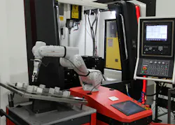 Machine tending arm, extended