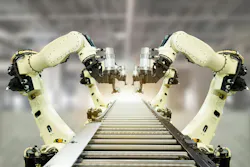 Robotic arms on conveyor belt