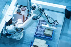 Robotic arm on plant floor